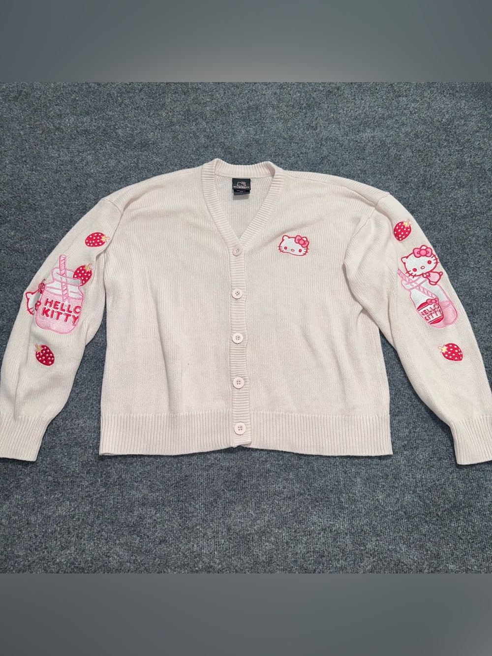 Hello Kitty Strawberry Milk Skimmer Cardigan with pink knit fabric